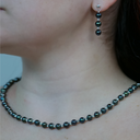 Arnolfini Black Pearl Necklace Model Photo.webp